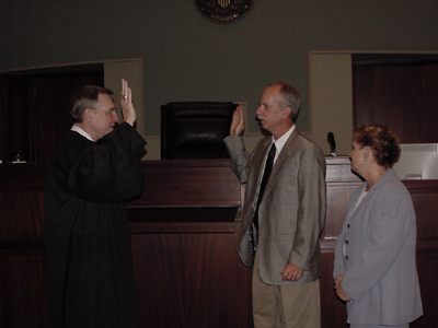 Stephen Haymes being sworn into office